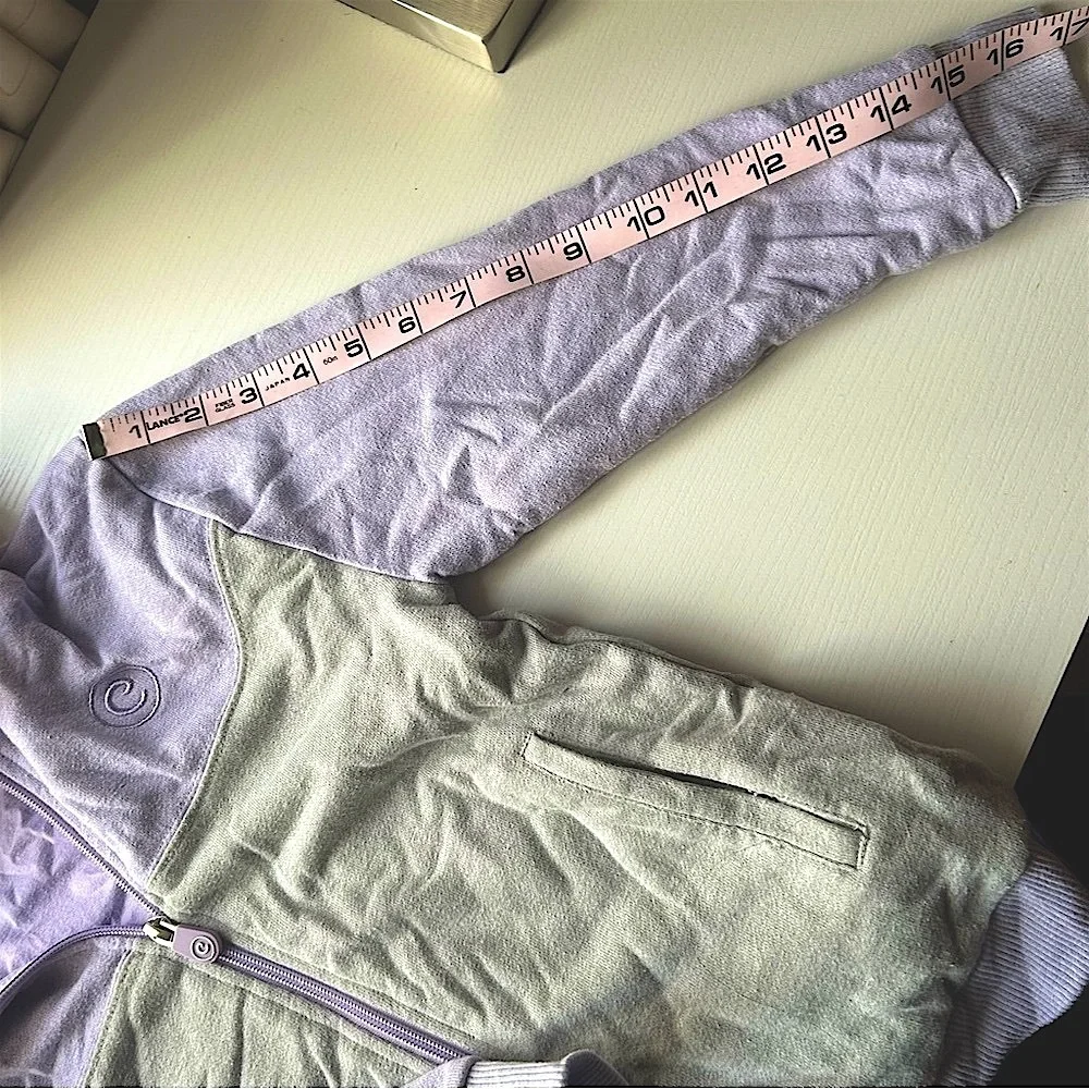Good condition Lavender and gray packable jacket /Plush Seal kid size 8